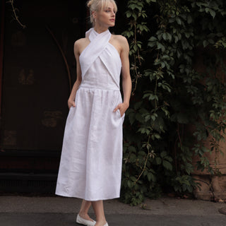 White linen midi dress with crossover details