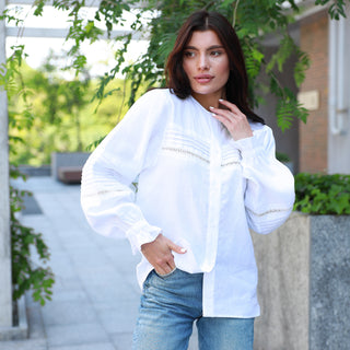 White linen shirt with pleats and lace details
