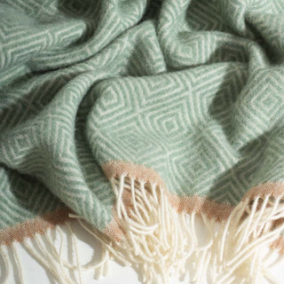 Merino wool throw with geometric pattern