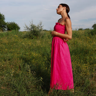 Side view strapless midi dress in fuchsia