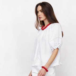 Side view white linen top with lace details